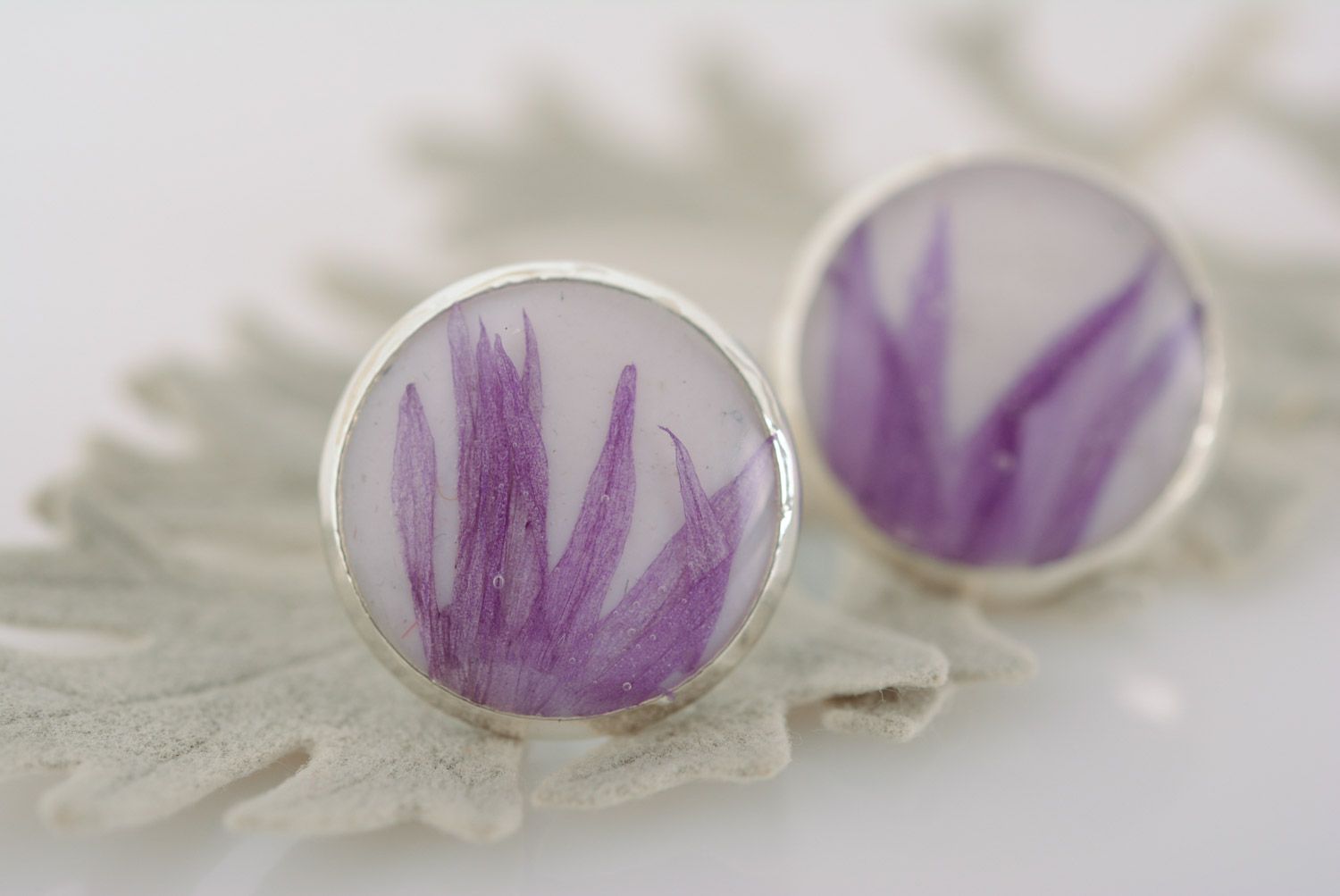 Small tender blue stud earrings with dried flowers in epoxy resin homemade photo 1