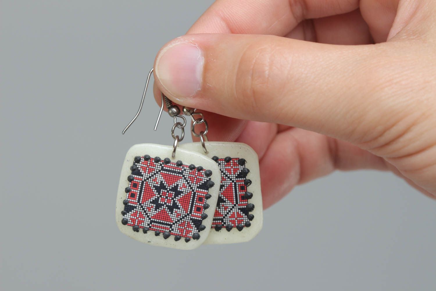 Handmade polymer clay white earrings with red and black ornament in ethnic style photo 5