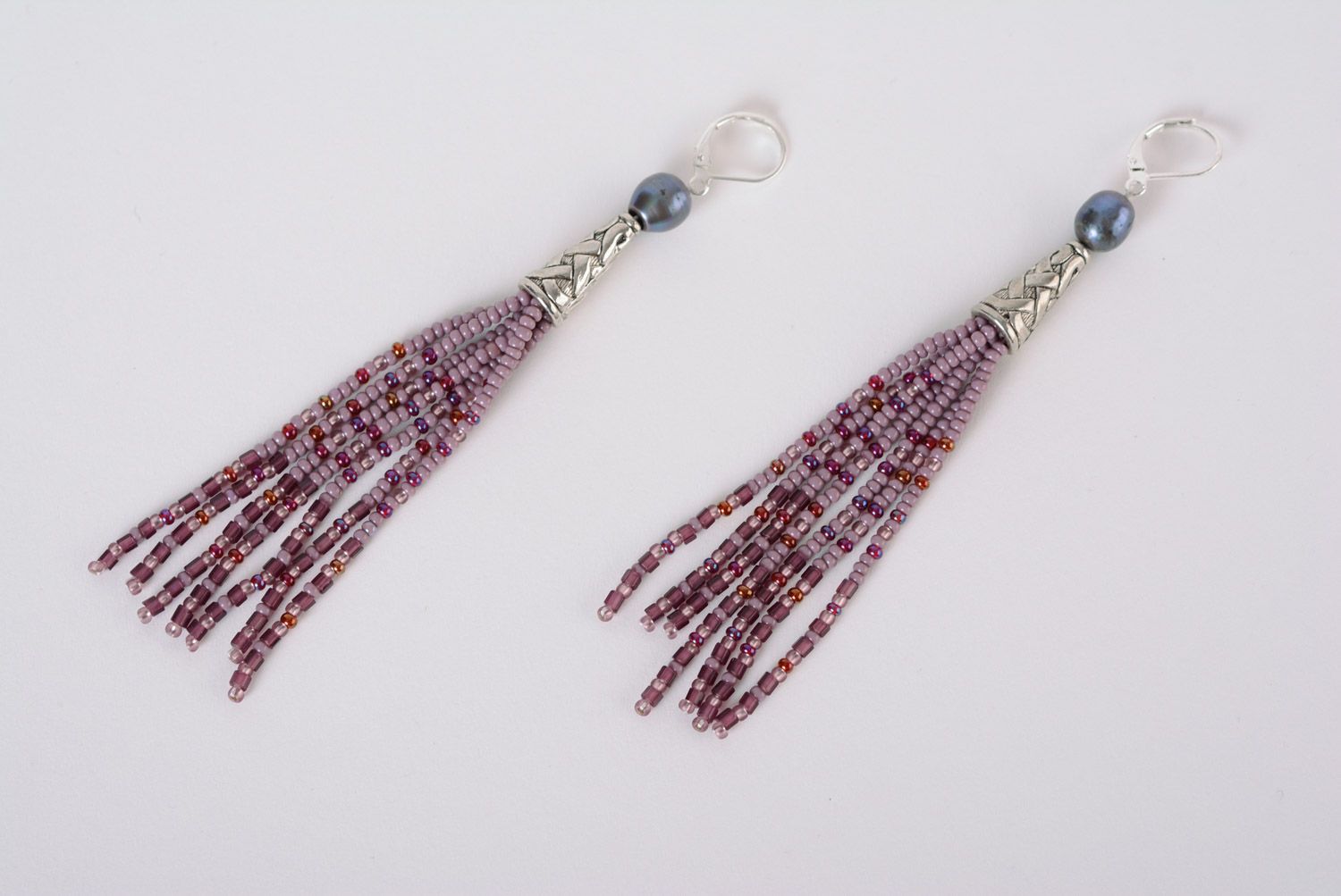 Unusual handmade long beaded earrings of lilac color with fringe and river pearl photo 1