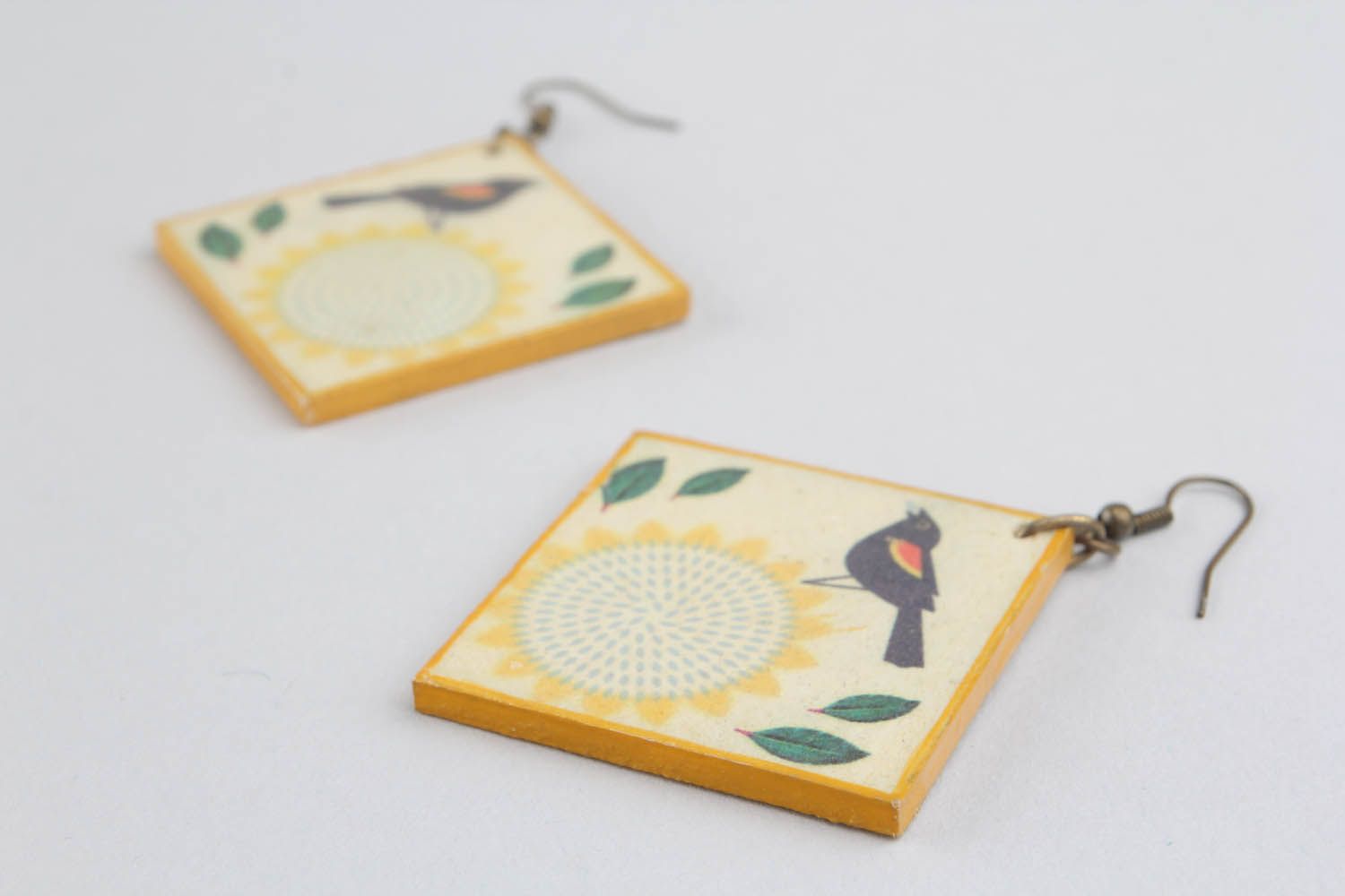 Wooden earrings with epoxy resin photo 3