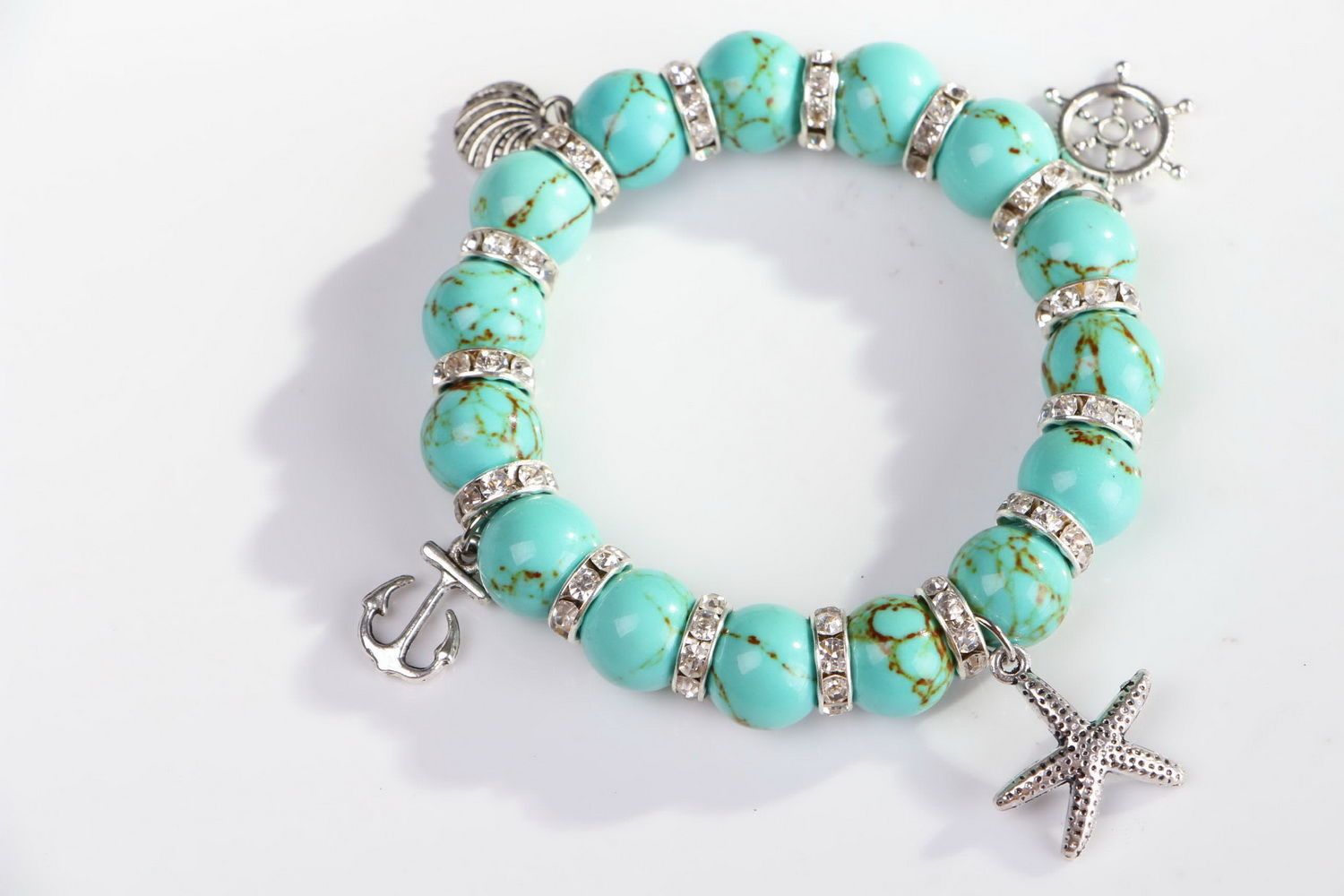Bracelet with turquoise and pendants on elastic band photo 2