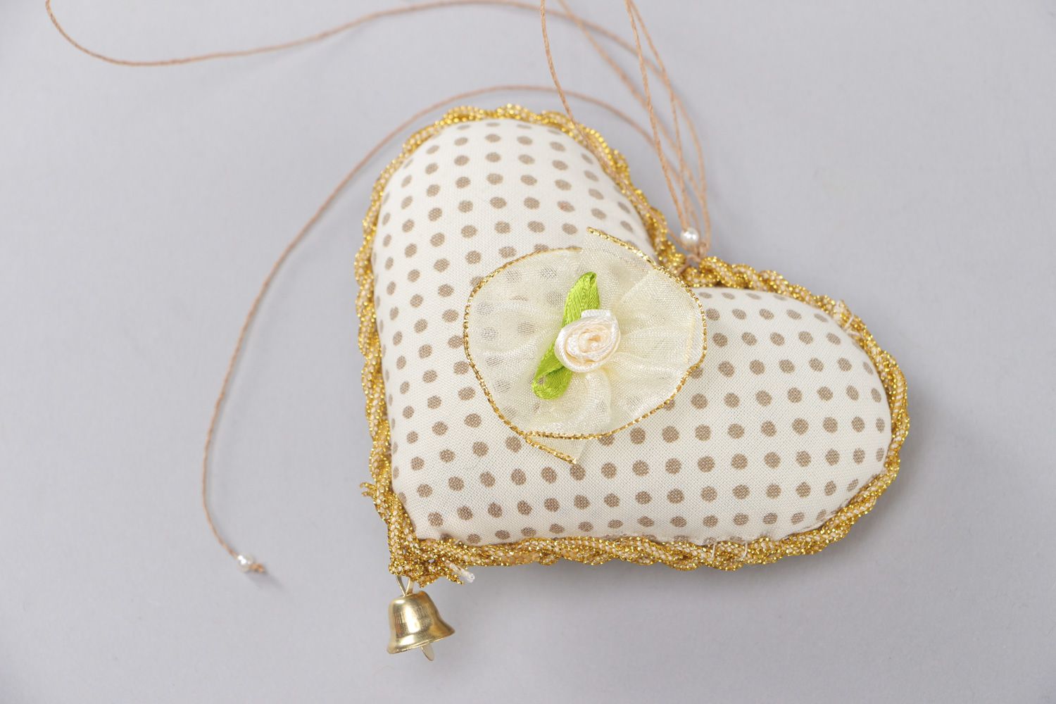 Handmade heart-shaped wall hanging sewn of polka dot fabric for interior decoration photo 1