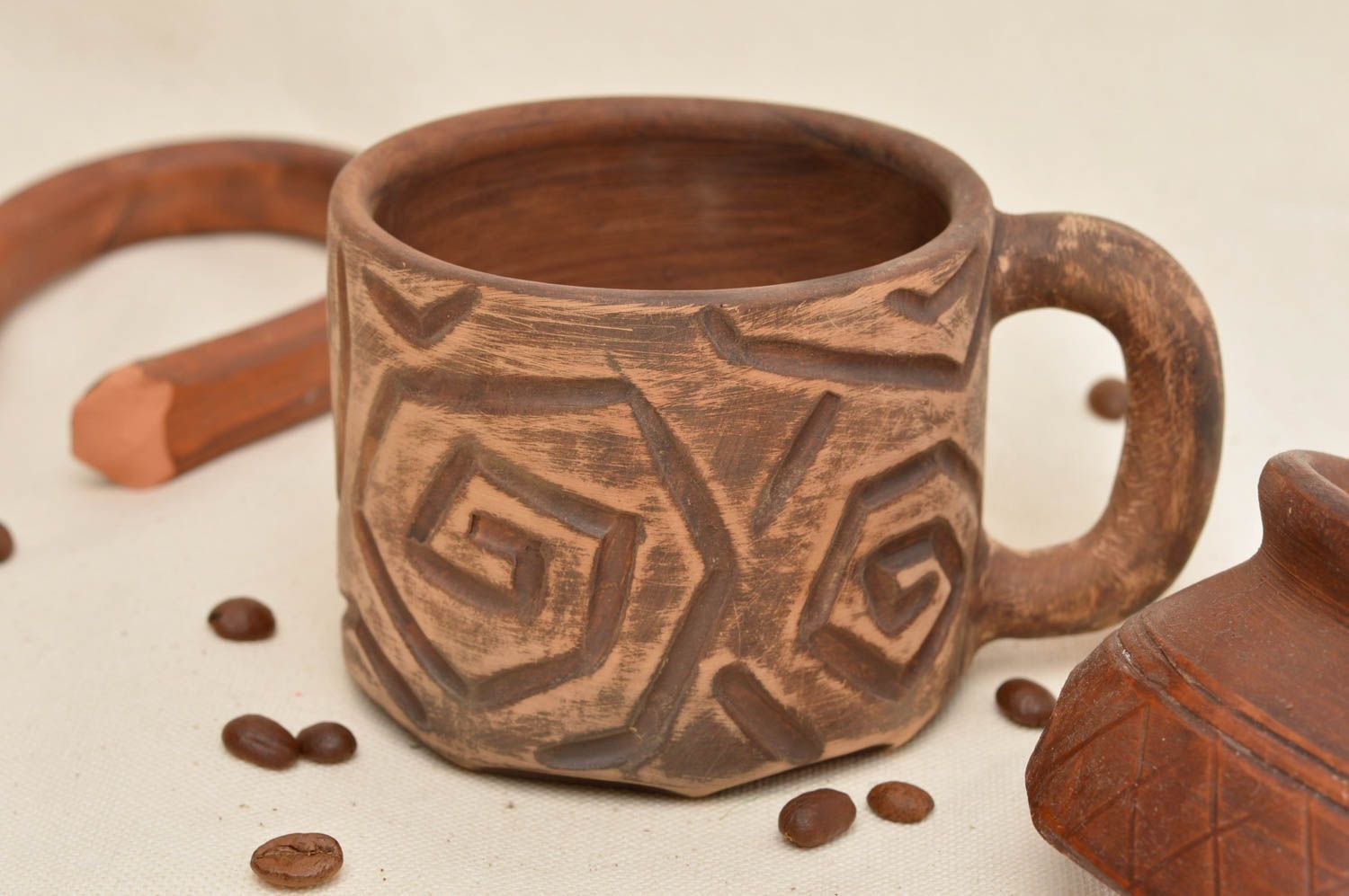 Clay ceramic middle size coffee mug with handle and pattern photo 1