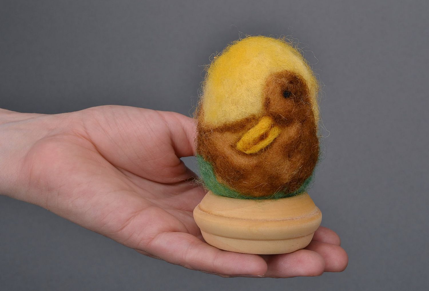 Egg on a wooden holder photo 5