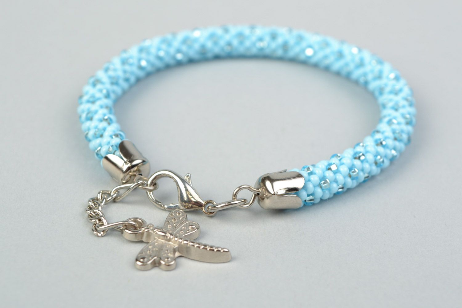 Tender handmade blue and silver beaded cord bracelet with dragonfly charm photo 4