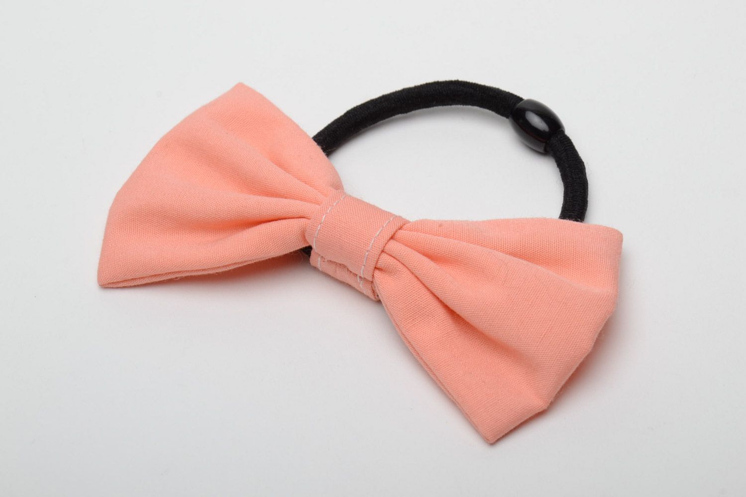 Handmade small women's cotton fabric bow hair tie of peach color photo 2