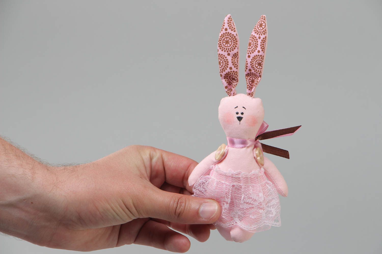 Handmade decorative pink bunny toy made of fabric present for children  photo 5