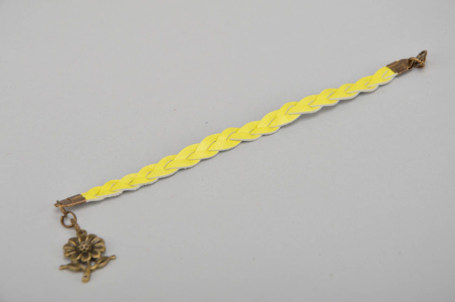 Handmade designer yellow genuine leather woven wrist bracelet with charm photo 3