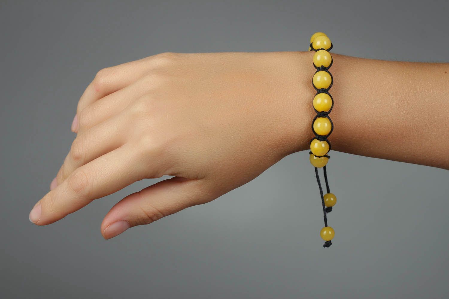 Yellow bracelet made ​​of natural stone photo 4