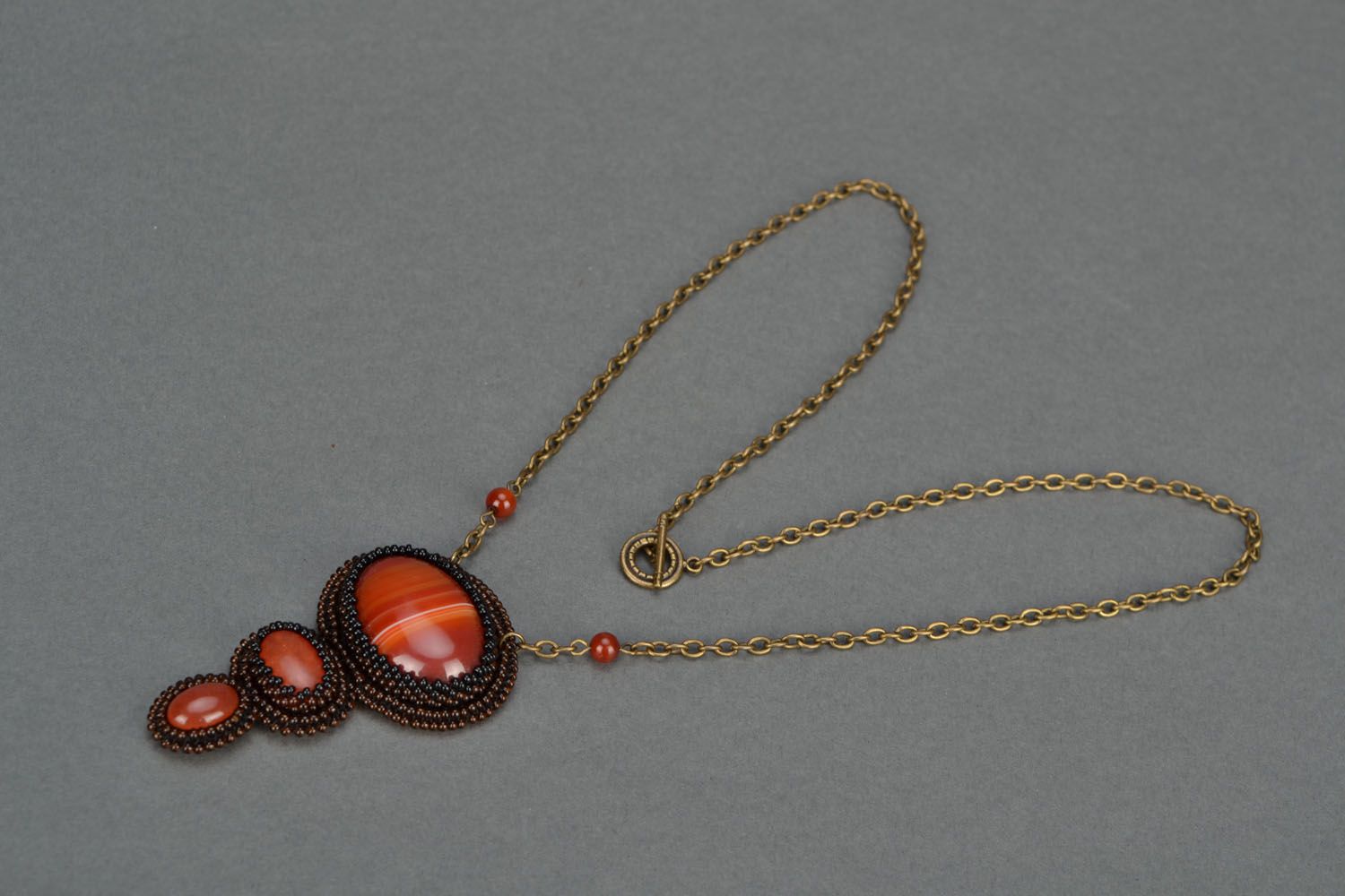 Handmade pendant with cornelian stone photo 1