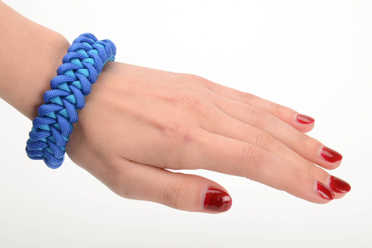 Handmade wrist survival bracelet woven of blue parachute cord with plastic fastener photo 5