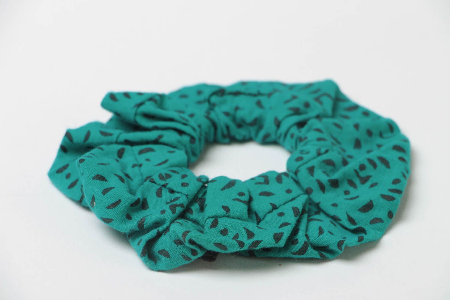 Handmade decorative fabric elastic band of turquoise color with black spots photo 3