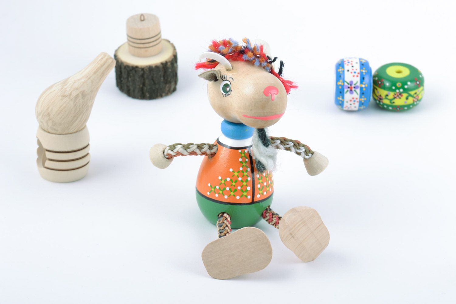 Funny bright wooden eco toy goat painted with eco dyes handmade for children photo 1