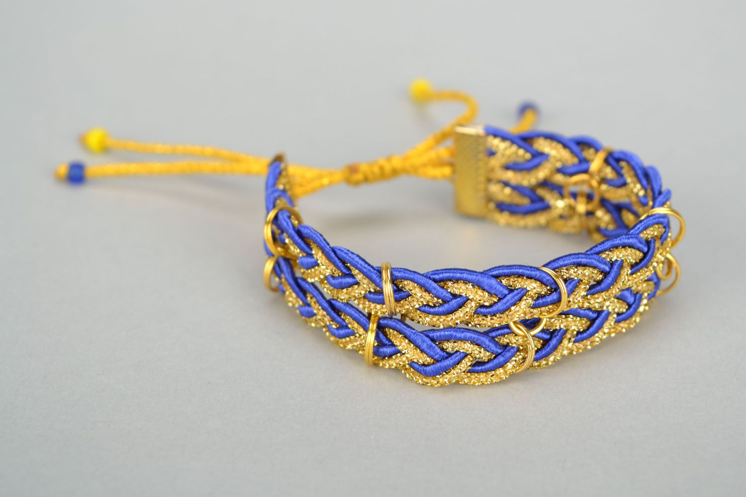 Blue and yellow friendship bracelet photo 2