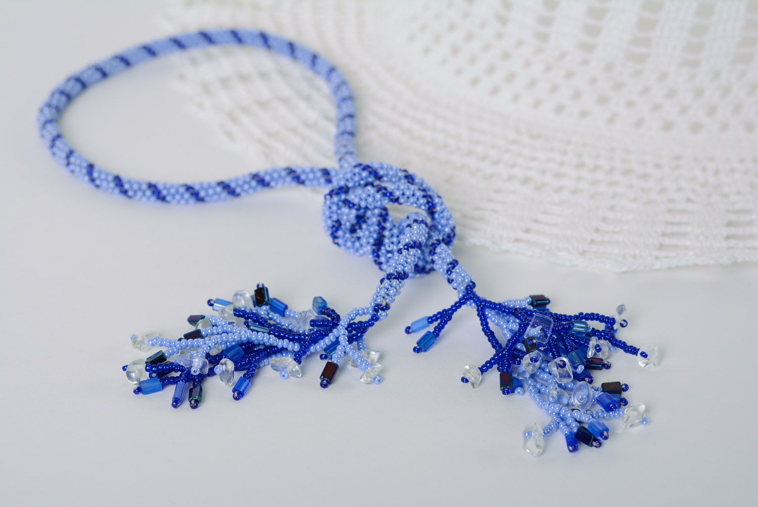 Handmade beautiful long necklace woven of beads in blue color palette for women photo 1