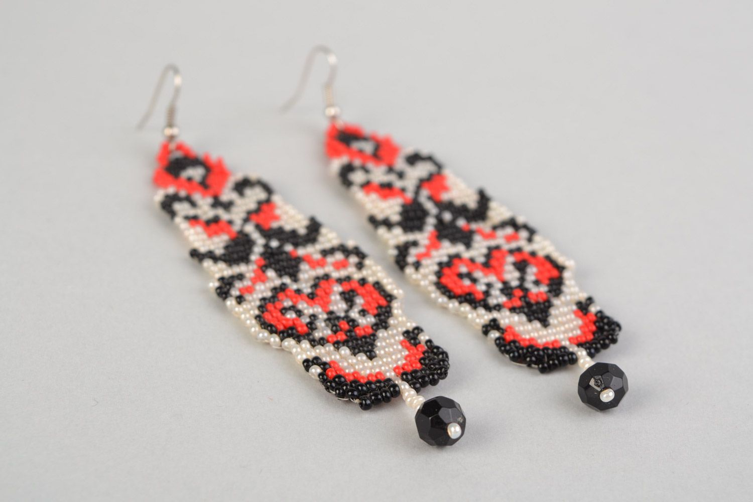 Handmade long dangling beaded earrings with ethnic motives black white and red photo 4