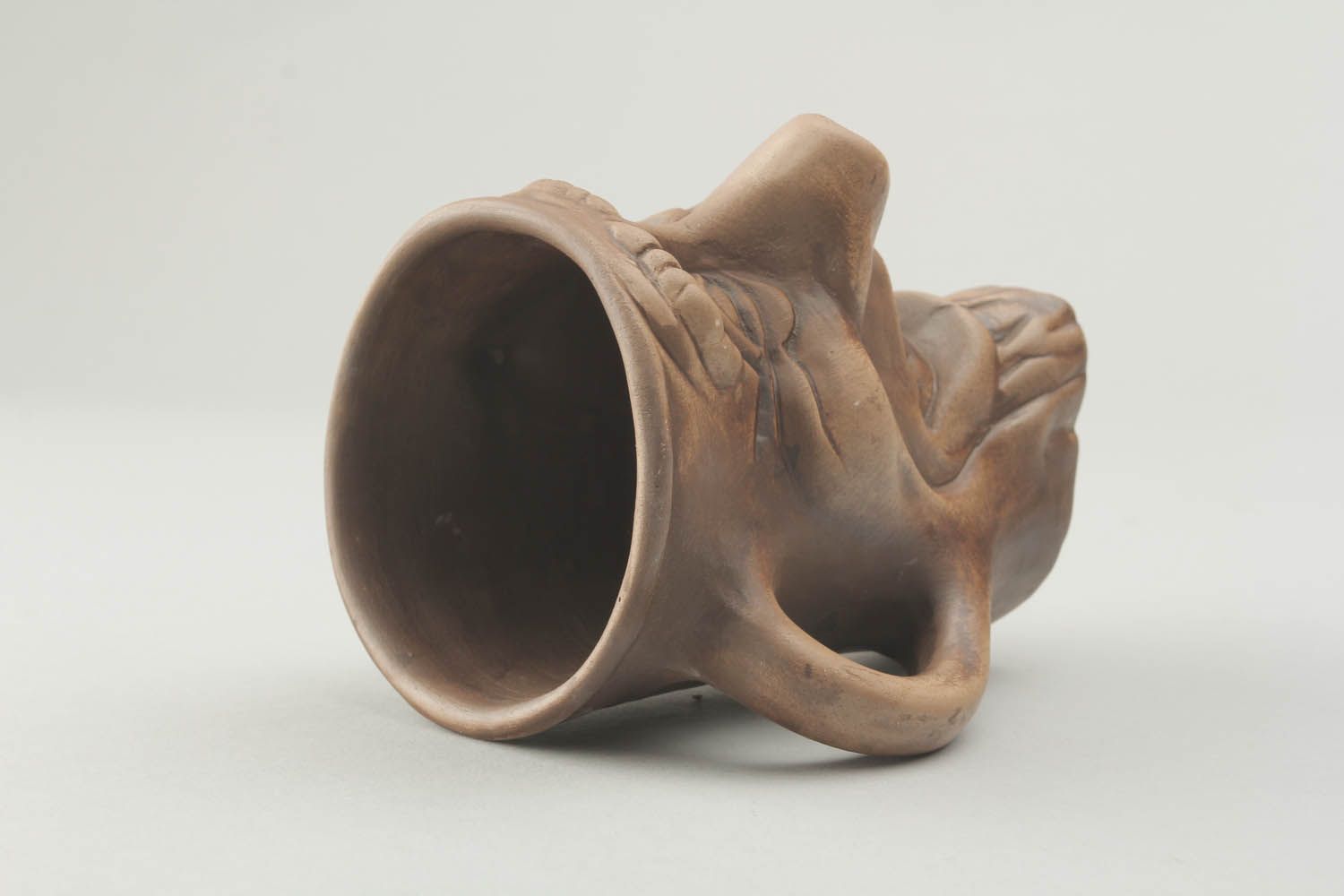 Laughing man's shape clay cup with handle photo 5