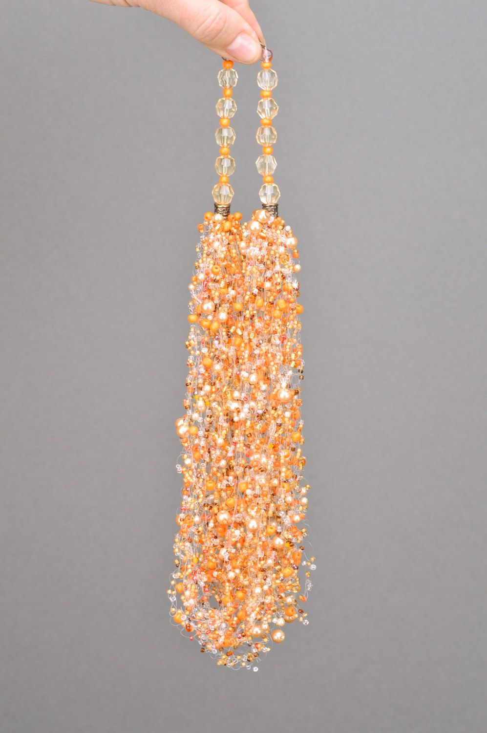 Unusual handmade long airy beaded necklace of orange color photo 3