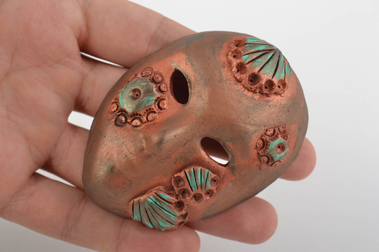 Handmade fridge magnet in shape of souvenir mask made of clay of bronze color photo 2