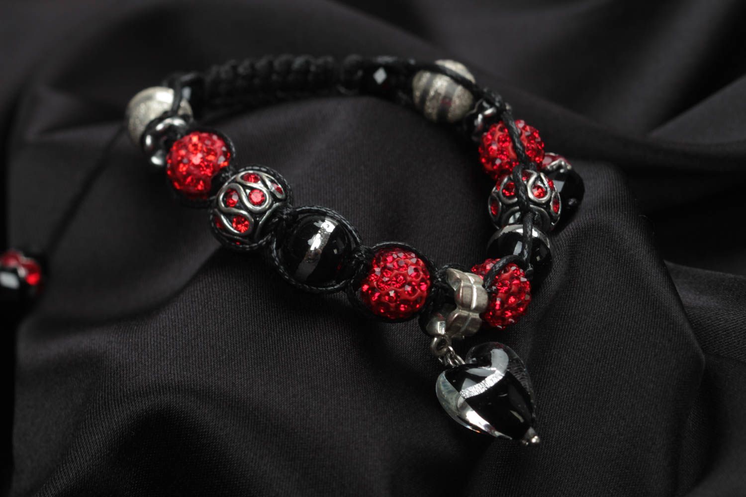Black rope cord strand bracelet with black, red beads and heart-shaped charm photo 2