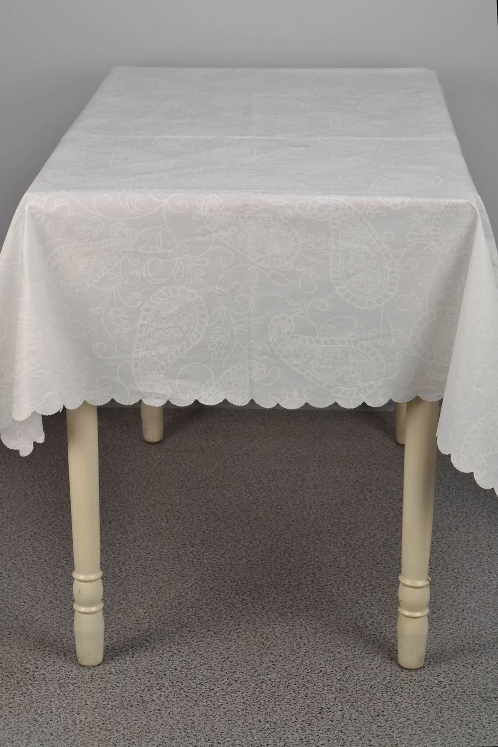 White ornamented tablecloth photo 2
