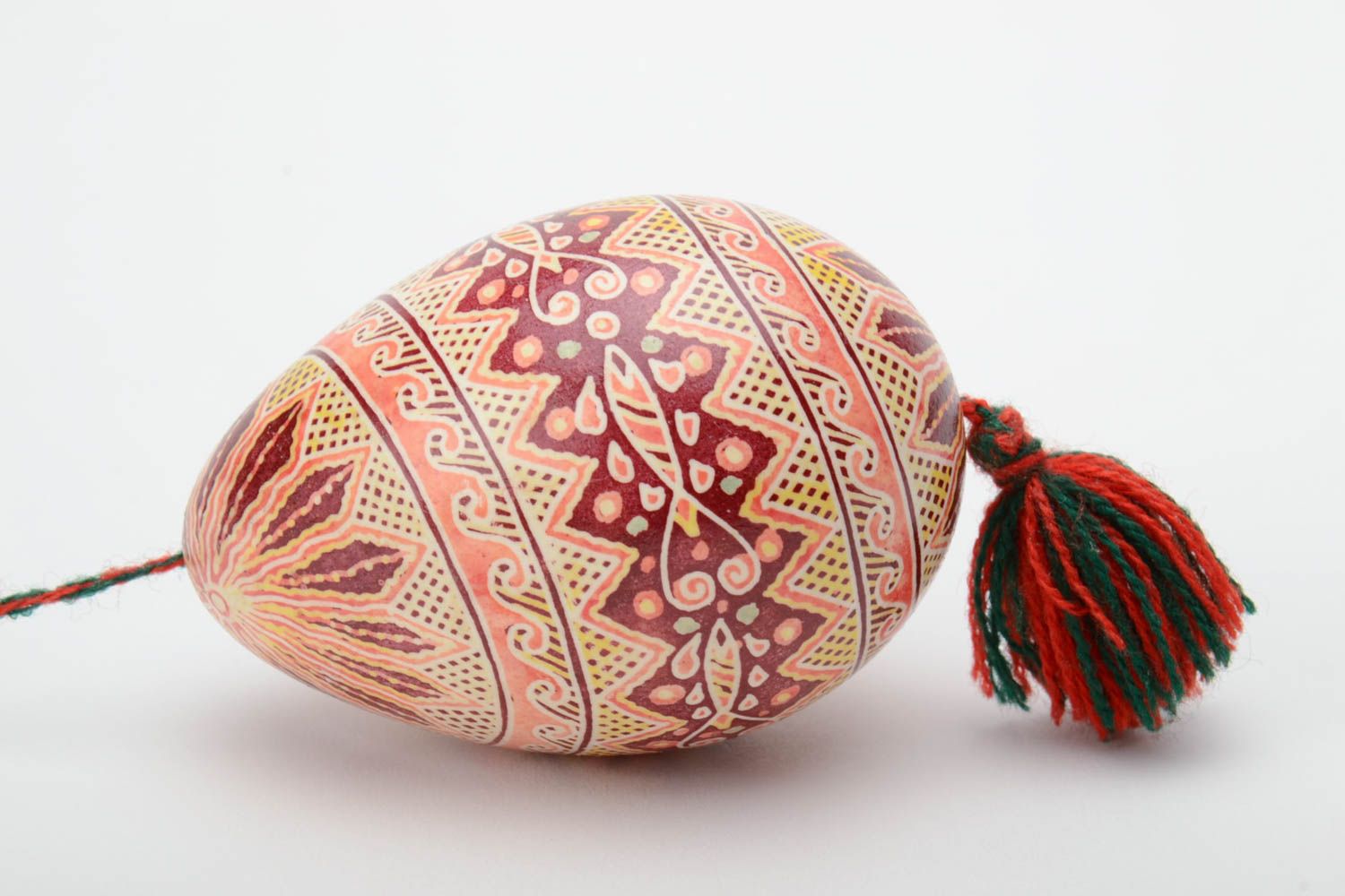 Handmade decorative light art painted Easter egg pysanka with eyelet and tassel photo 2