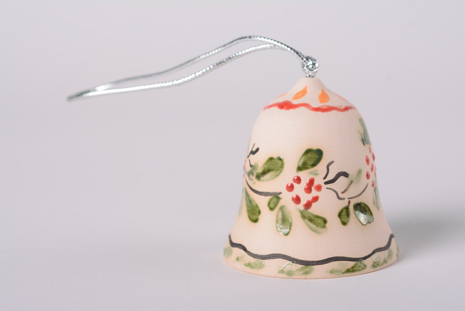 Handmade tender decorative maiolica ceramic bell with floral glaze painting photo 1