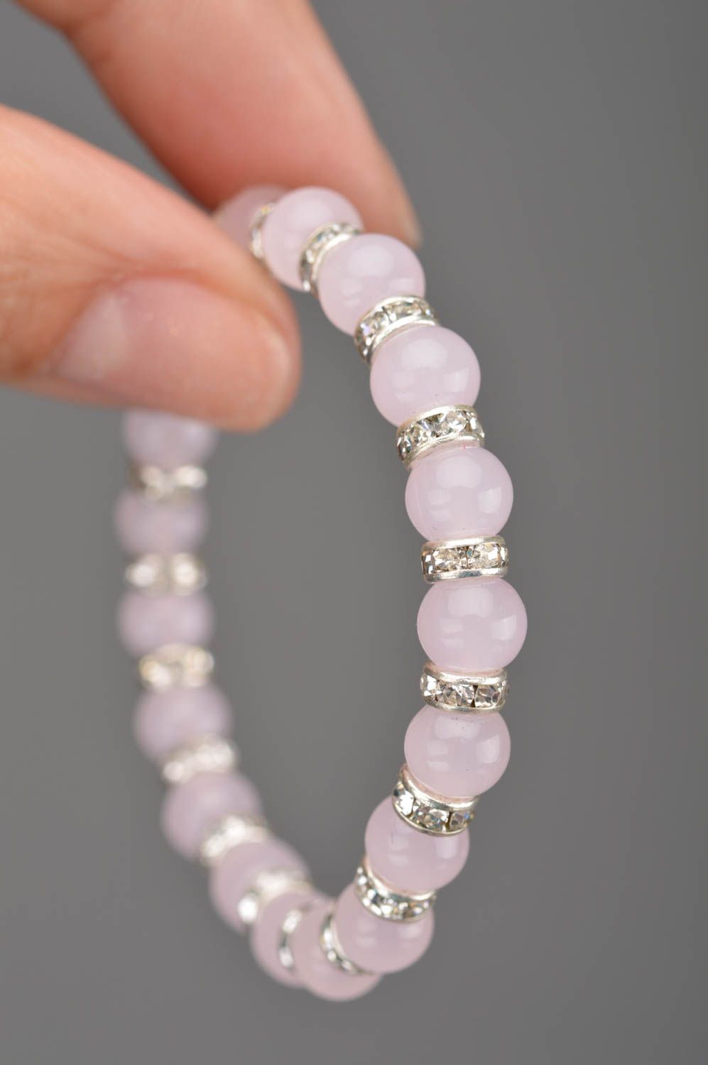 Beautiful handmade designer stretch wrist bracelet with gentle pink beads photo 2