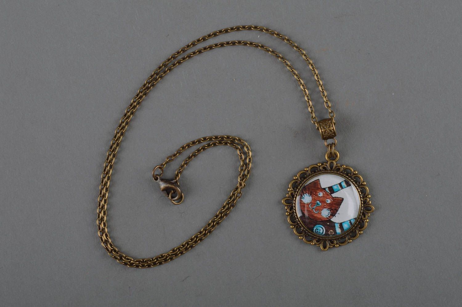 Unusual stylish handmade designer decoupage round pendant coated with epoxy photo 1
