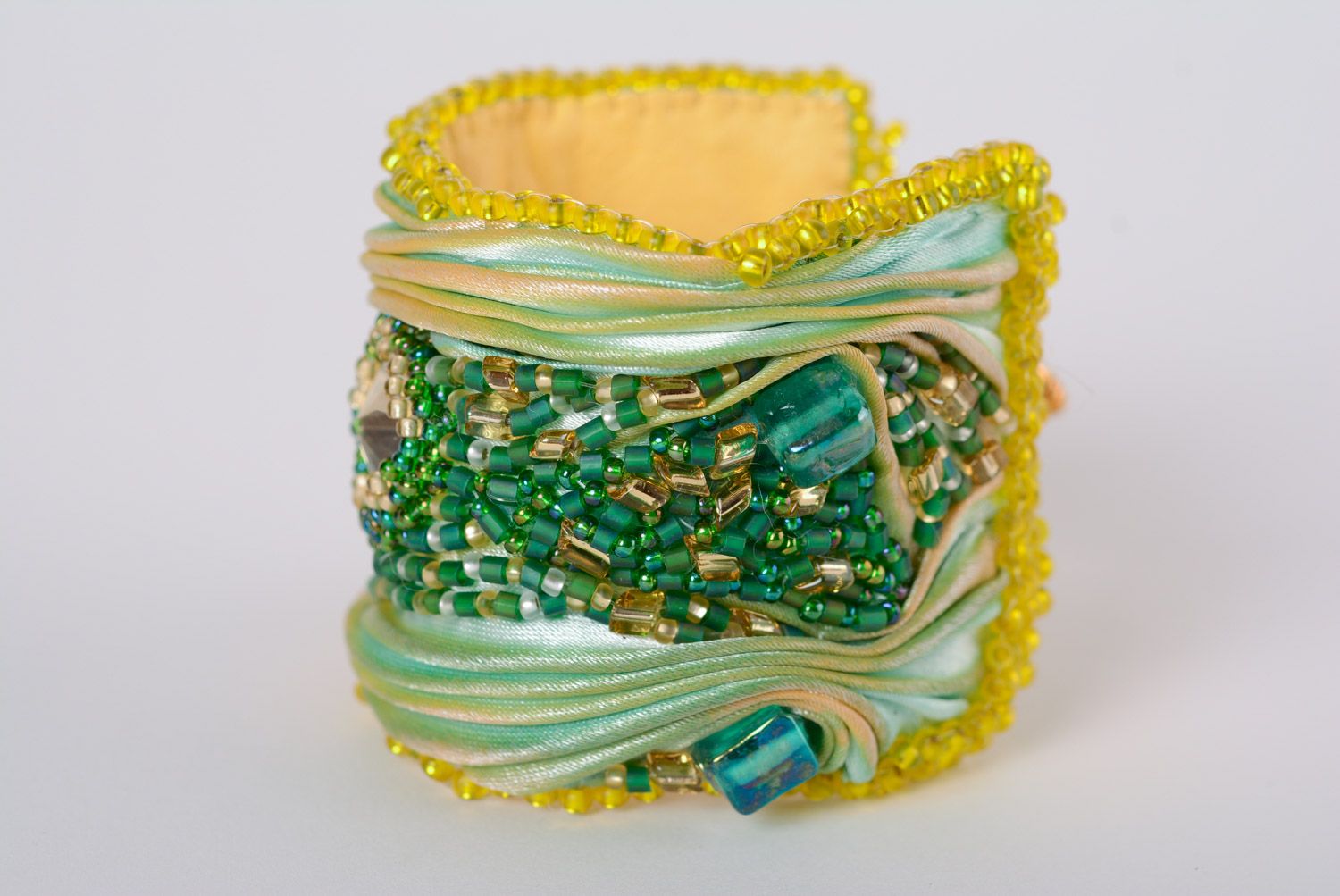 Artificial leather cuff wide bracelet decorated with small and large green beads. Great gift for mom photo 1