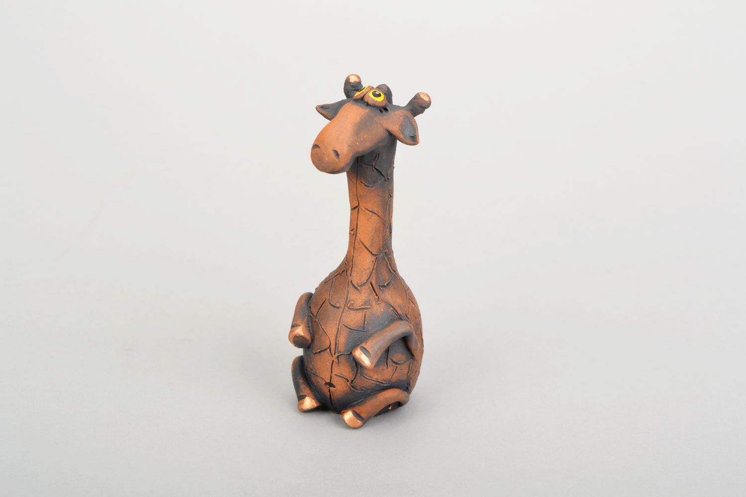Statuetta giraffa in argilla fatta a mano figurina decorativa in ceramica 
 foto 3