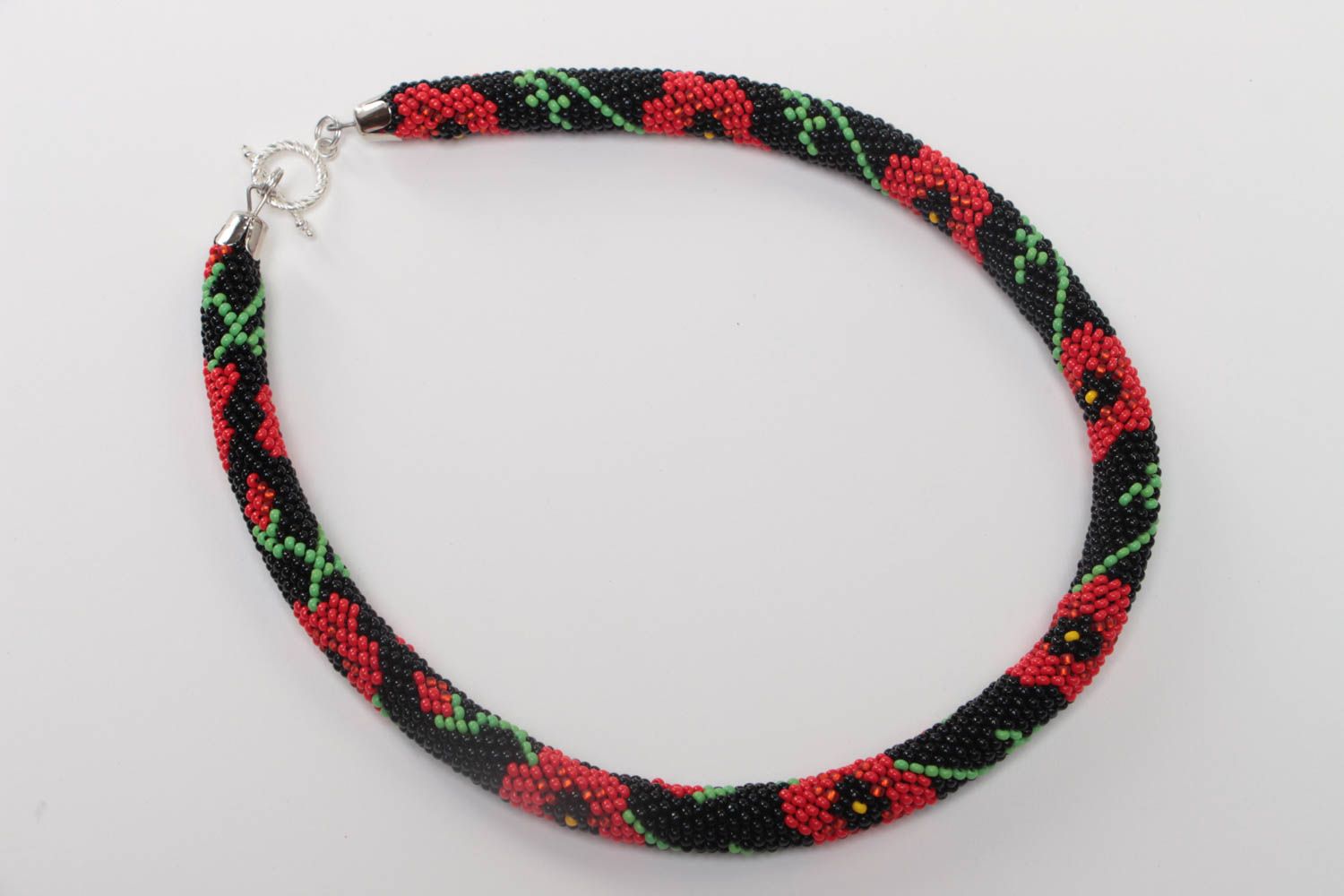 Handmade black beaded cord necklace with bright floral pattern in ethnic style photo 2