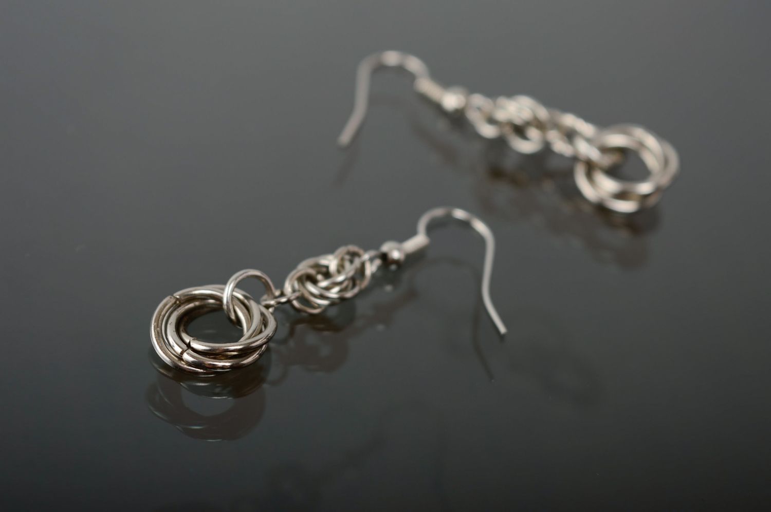 Handmade metal earrings created using chain armor weaving technique photo 5