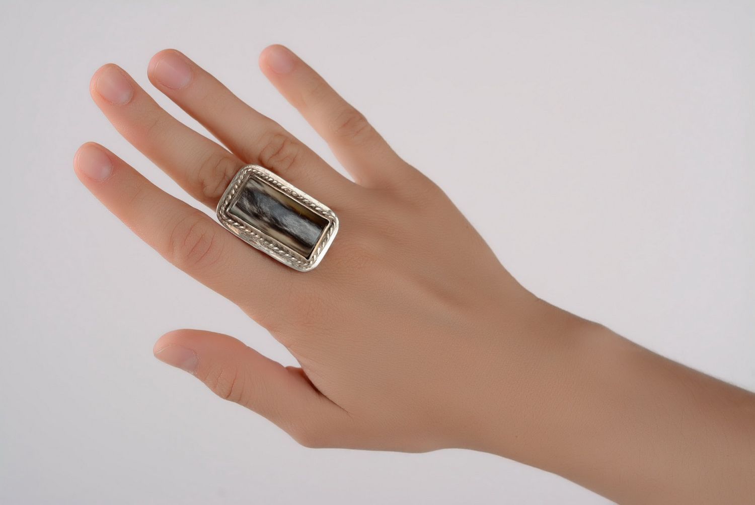 Silver ring with horn photo 2