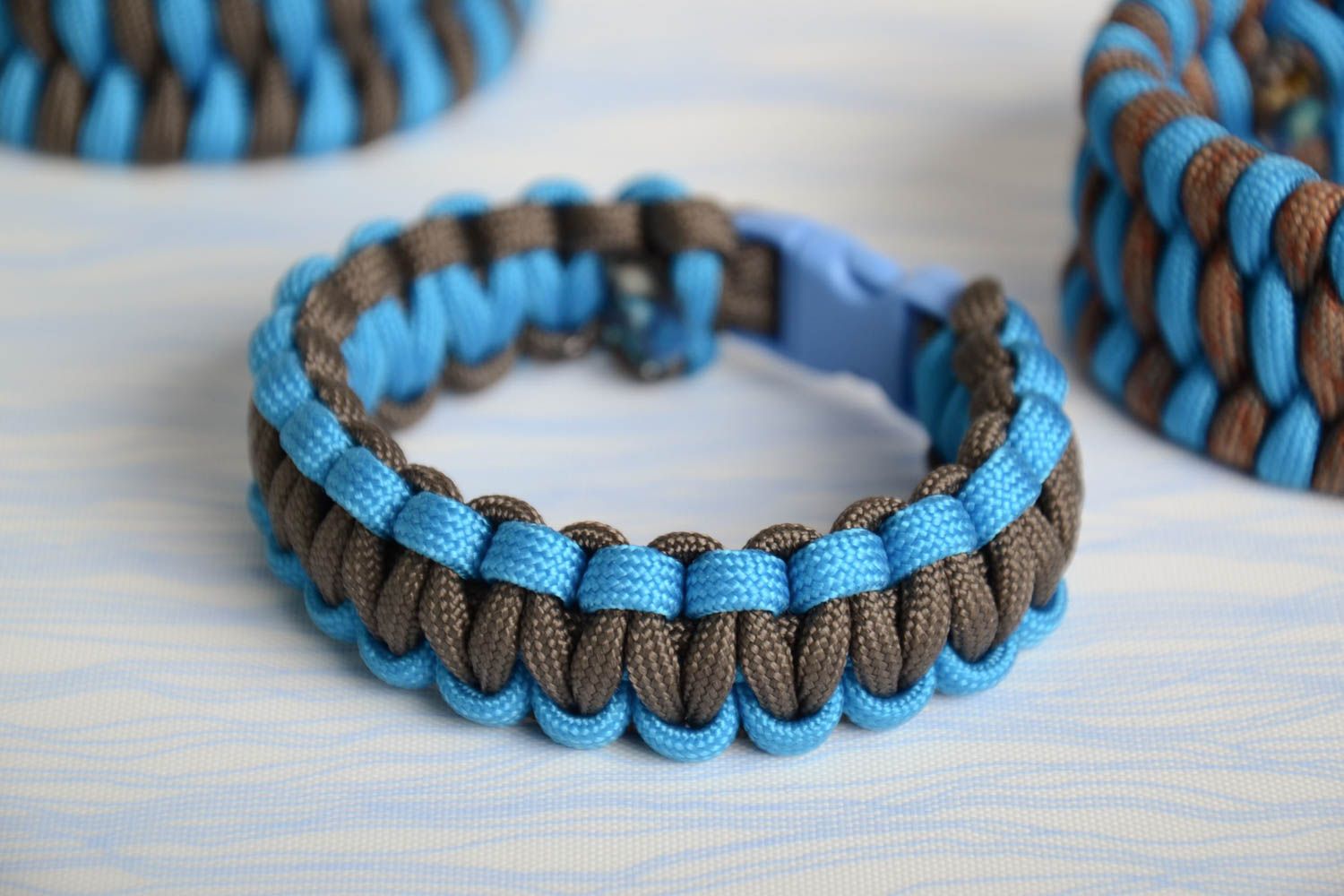 Blue handmade survival bracelet woven of American paracord photo 1