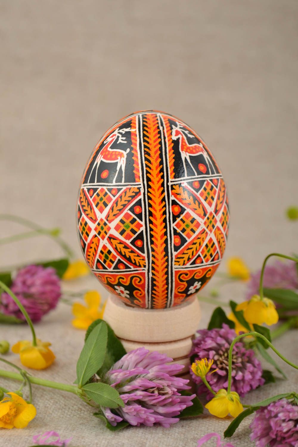 Beautiful homemade painted Easter egg with elks drawing photo 1