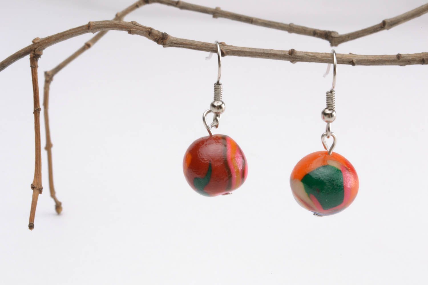 Polymer clay earrings with round pendants photo 1