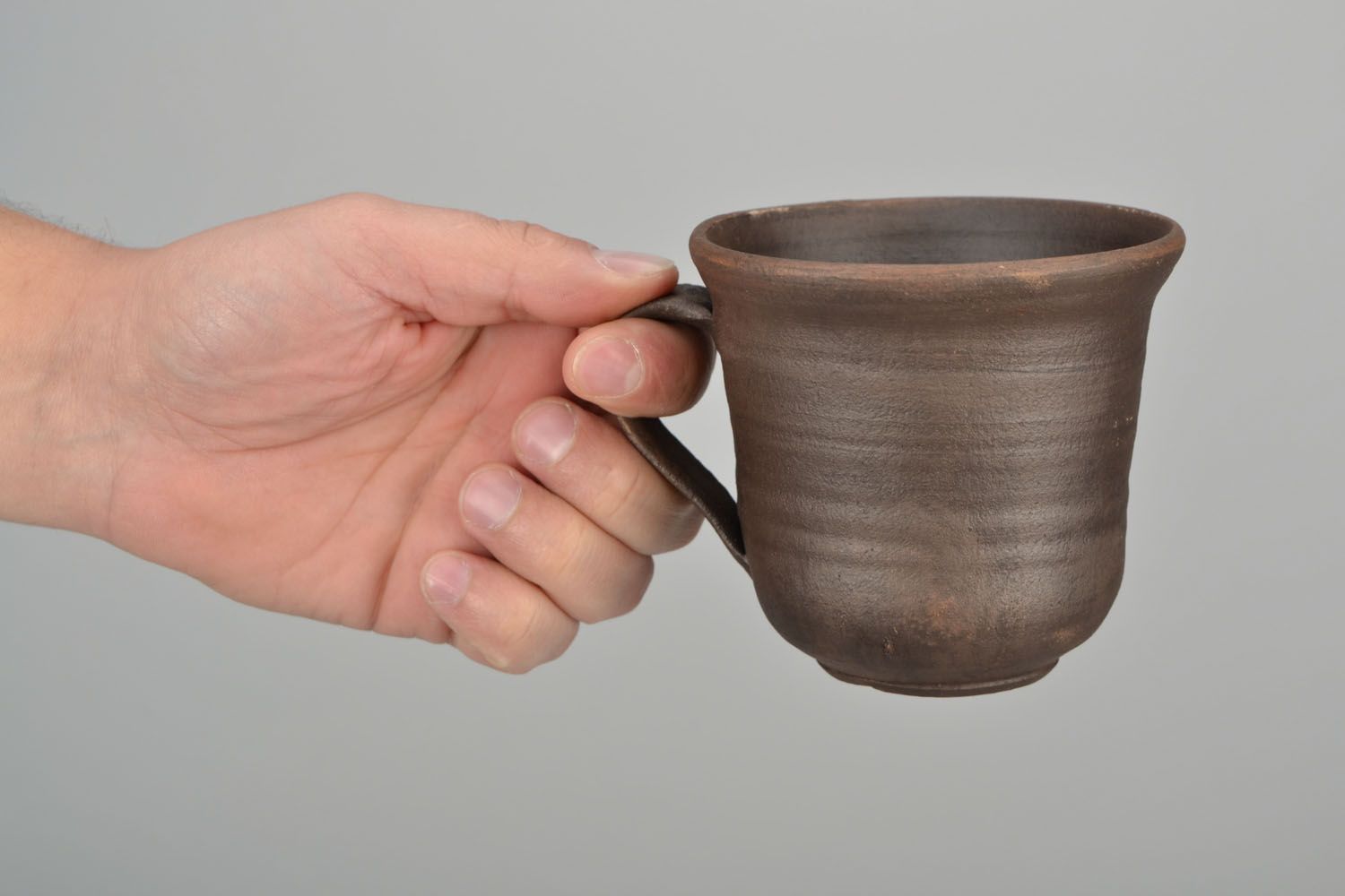5 oz brown clay cup with handle and no pattern photo 2