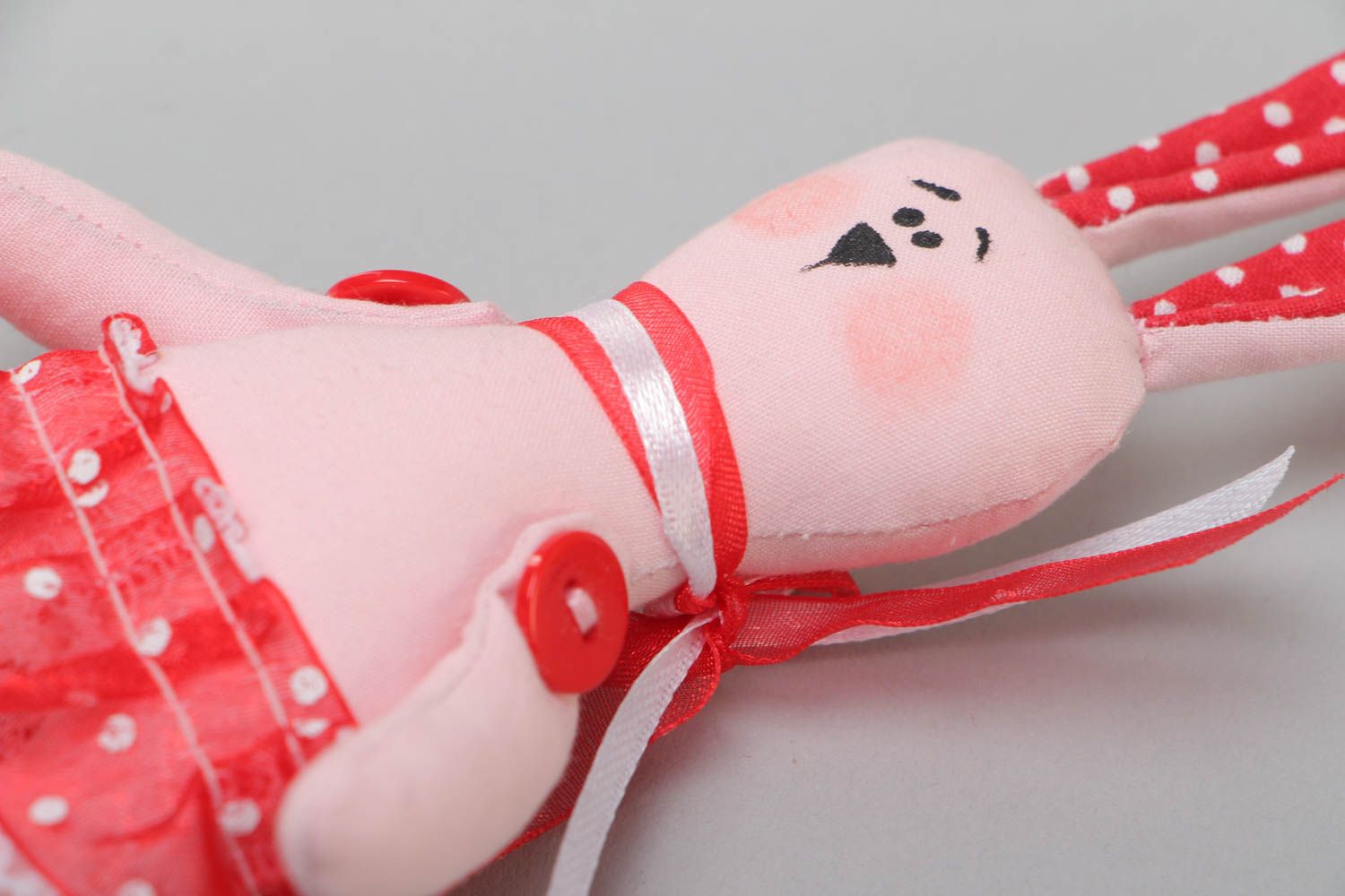 Handmade small cotton fabric soft toy pink rabbit in red skirt for children photo 3