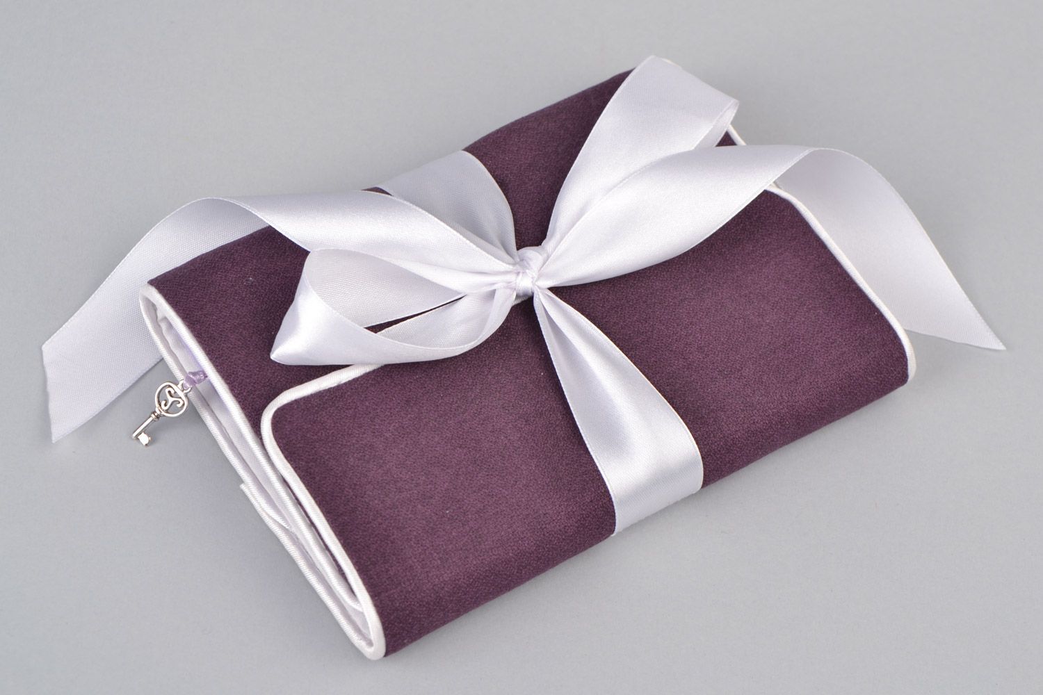 Handmade notebook with soft violet fabric cover and white bow for 100 pages photo 1