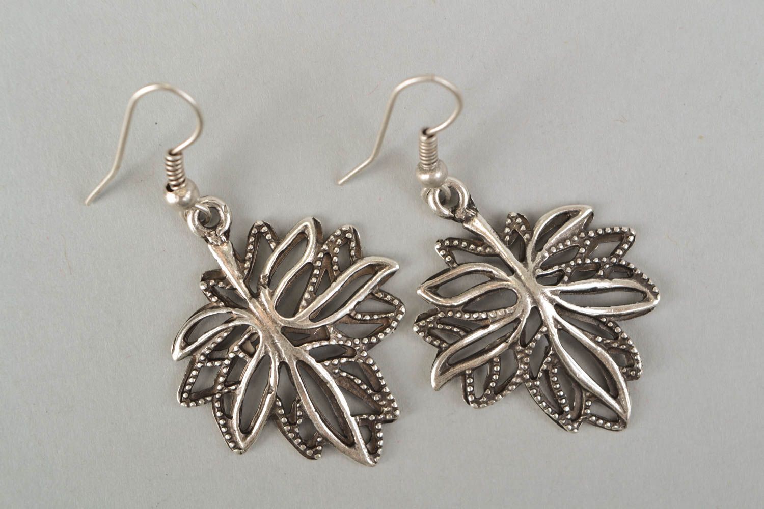 Handmade metal earrings in the shape of leaves photo 3