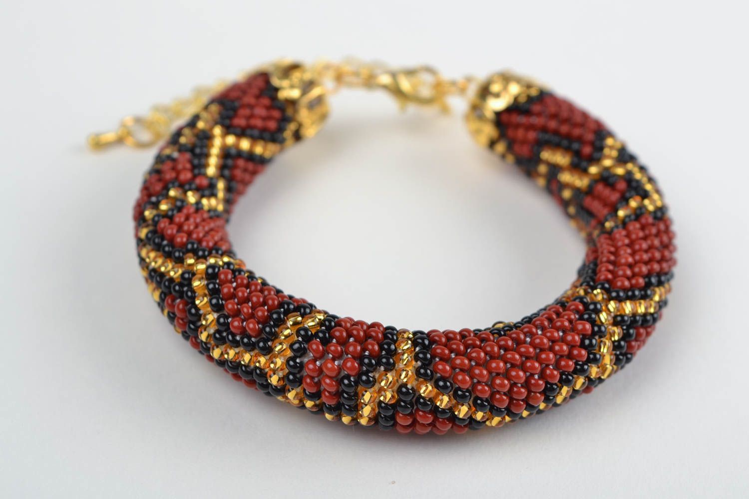 Corded beaded handmade crocheted bracelet with an animal print Python photo 4