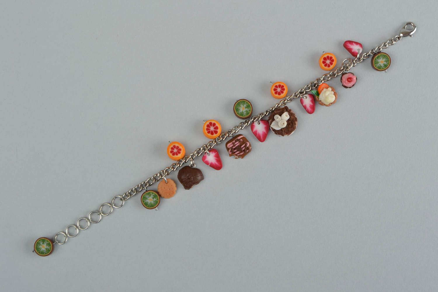 Handmade bracelet made of polymer clay on chain with decorative sweets photo 4