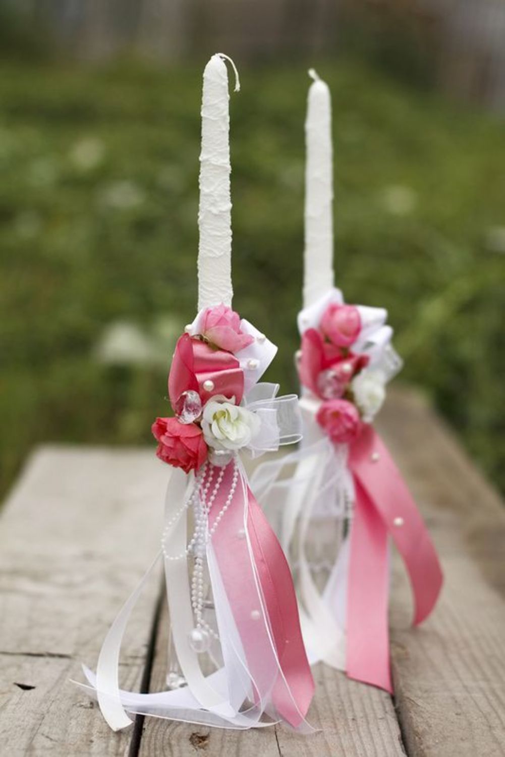 Wedding candle with pink ribbons photo 1