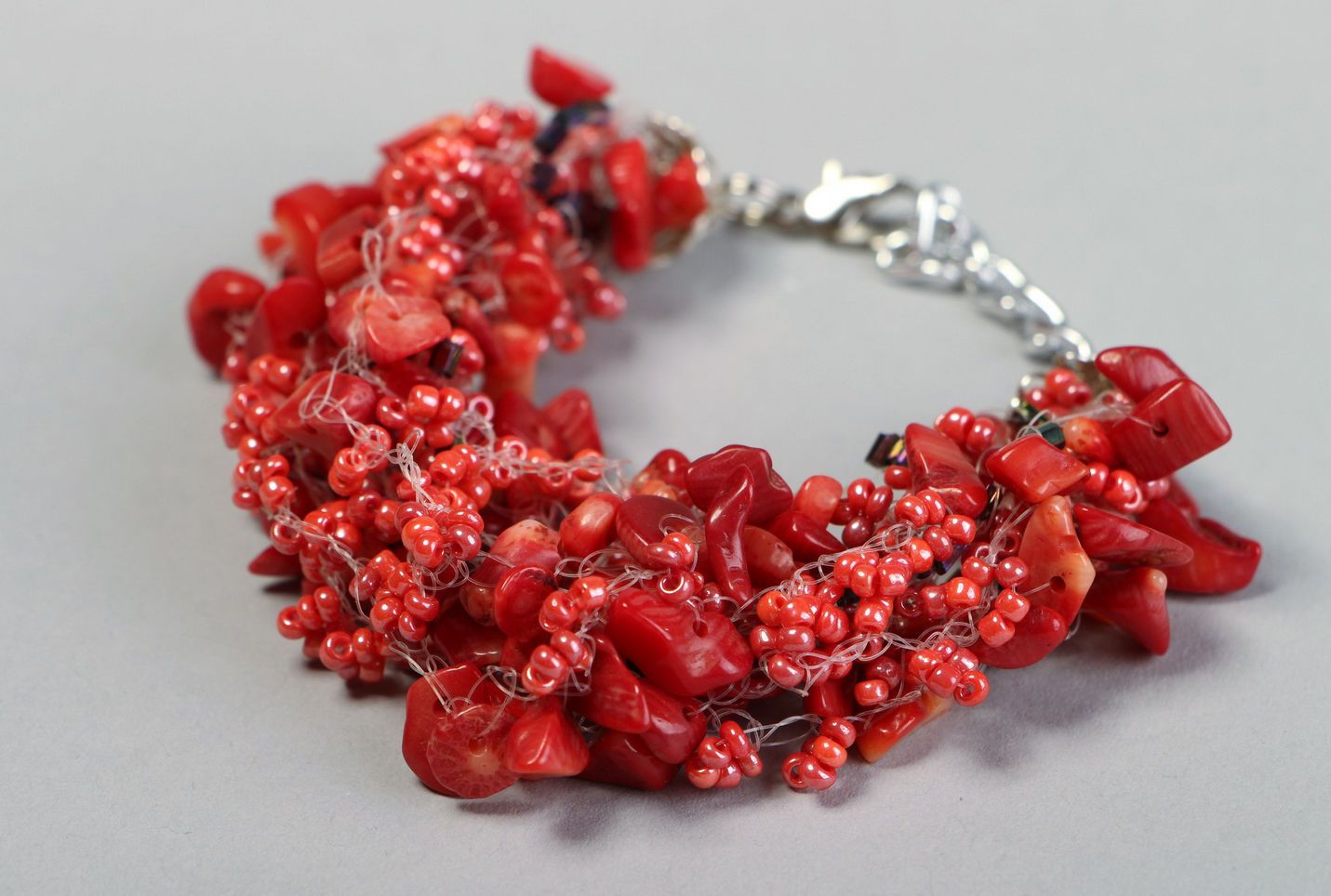 A bracelet with coral and beads photo 2