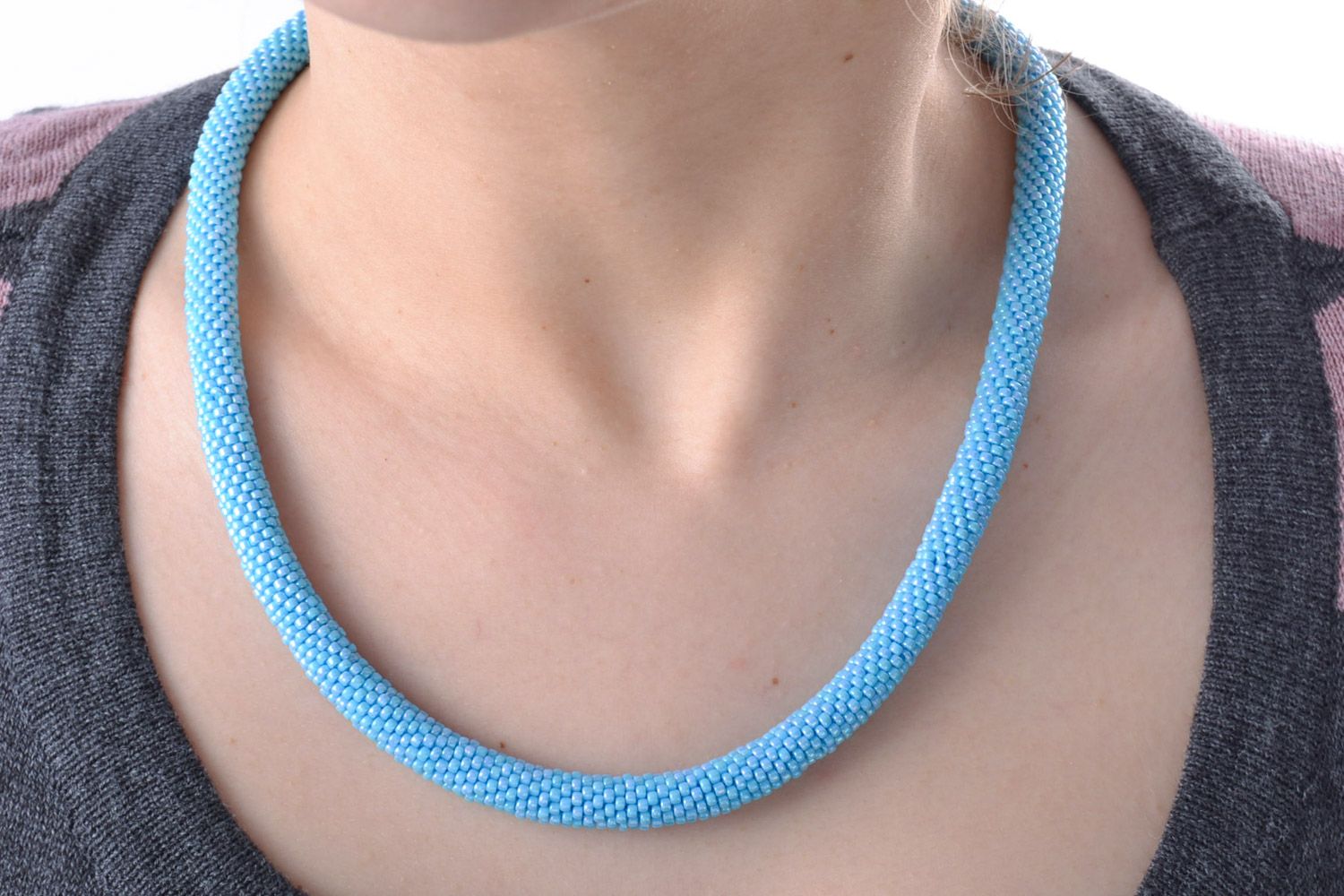 Beautiful handmade women's plain woven beaded cord necklace of blue color photo 1