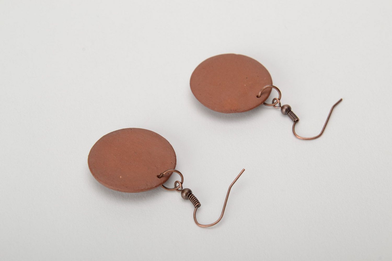Handmade brown ceramic dangle earrings of round shape painted with enamels photo 4