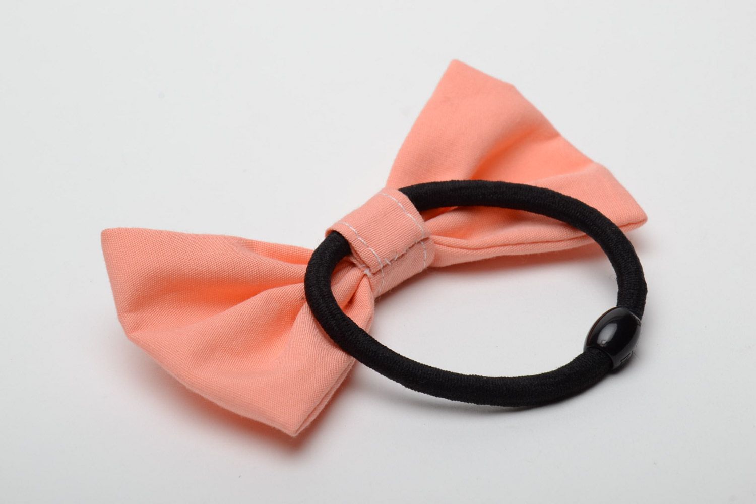 Handmade small women's cotton fabric bow hair tie of peach color photo 3