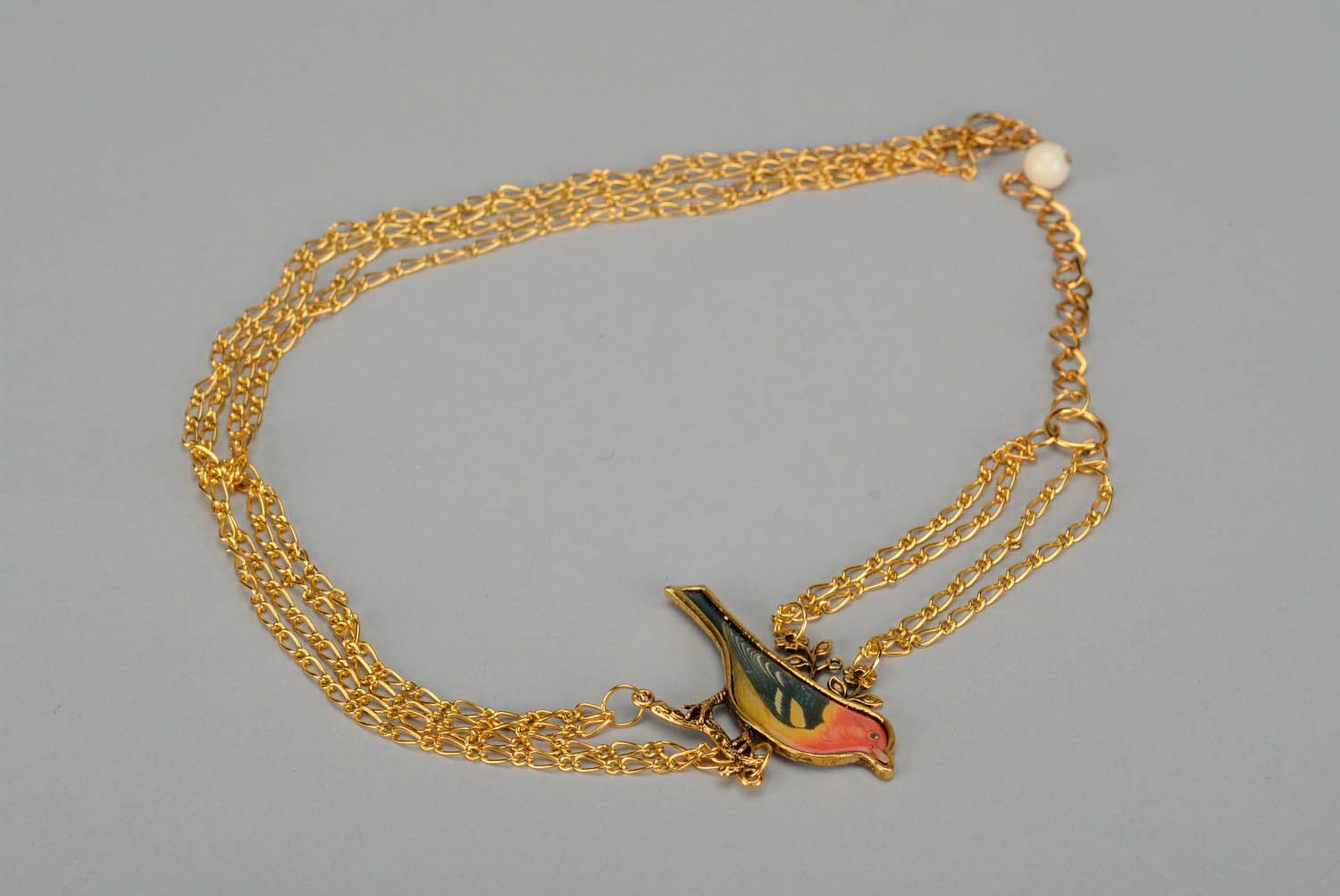Halskette mit Vogel foto 2