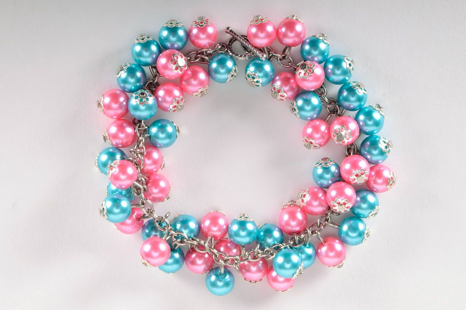 Wrist bracelet with ceramic pearls photo 2